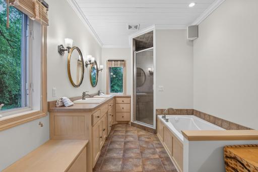 Unwind after a long day in the soaking tub or refresh in the spacious walk-in shower.