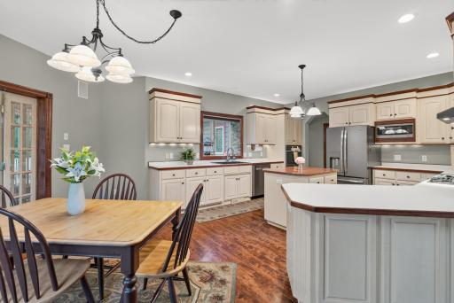 The open-concept kitchen and dining area create a natural gathering place at the heart of the home.