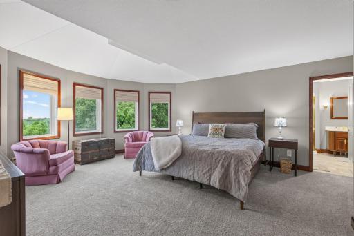 A rare secondary primary suite offers exceptional flexibility for multi-generational living, long-term guests, or evolving household needs.