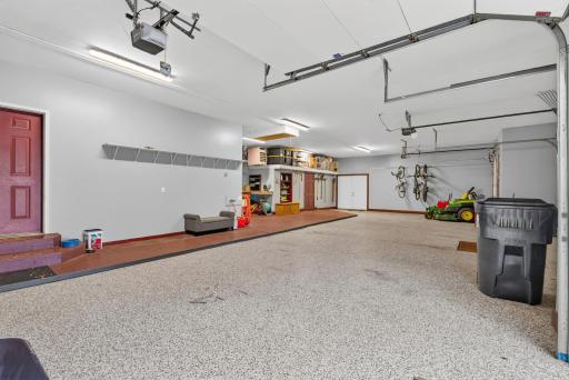 Finished, heated 4-car garage ready to be a workshop or storage for all your toys!