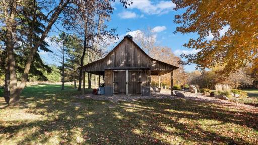 Front and rear covered porches, high-loft space and double-doors