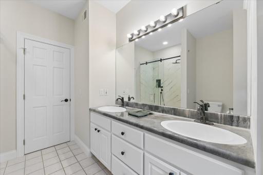 Dual Vanity, Custom Counters and Shower Surround
