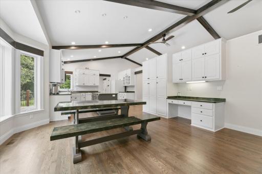 Gorgeous oak flooring seamlessly pulls throughout the main level. Walkout to deck, bay windows, amazing storage and organization.
