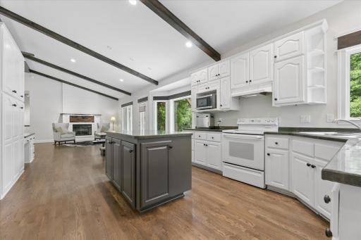 Open Floor Plan with variety of seating for daily living and hosting gatherings.