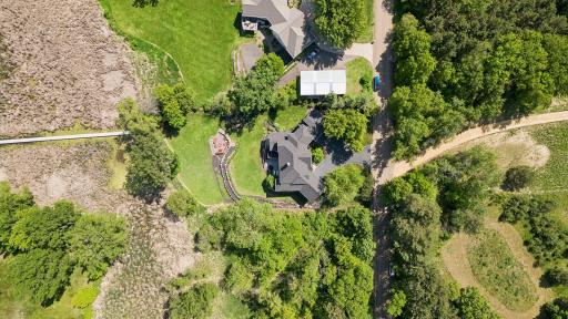 Aerial view of the home and it's location on the lot in relation to the lake.