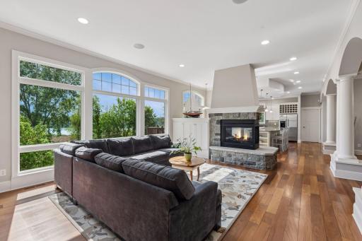 This view showcases the gorgeous view of the lake and the layout of the main level living area.