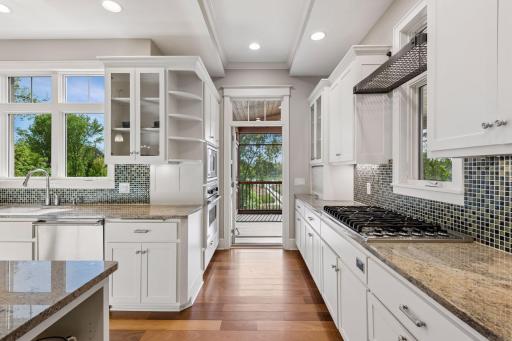 Smart, open layout brings the outdoors in. Enjoy an easy transition to the screened porch and a front-row seat to the water.