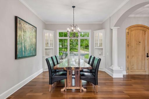 Another view of the formal dining room and the open foyer.