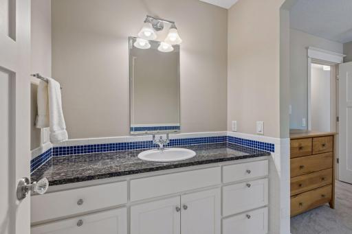 This is the private vanity area for the third bedroom on the upper level.