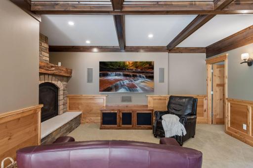 No detail was spared! Features acoustic sound-insulated walls, a hidden $7.2$ surround sound system with boxed in-wall speakers, and gorgeous, handmade solid alder and walnut cabinetry and bar.