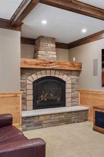 A true piece of Minnesota history. This conversation-starting mantle is a century-old wood beam from a northern Minnesota grain mill. The stunning, natural texture and variations were worn into the wood by 100 years of moving grain.