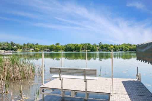 Cast a line right from your backyard! Whether you are taking in the peaceful water views or trying your hand at catching the lake's abundant fish varieties, this setup has it all. Best of all, the premium dock and boat lift are fully included!