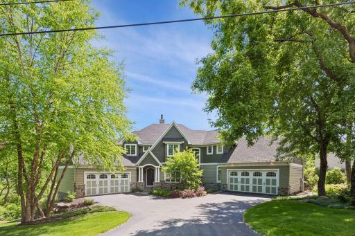 A true entertainer's dream on the water. From the hidden staircase to the expert custom woodwork, this luxury build has it all. Enjoy seamless indoor-outdoor living with multiple dedicated hosting areas.