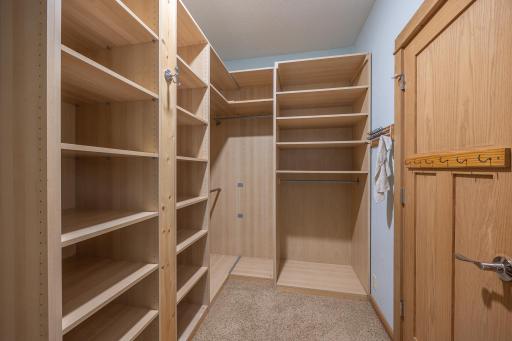 Additional views of custom closet in primary main floor bedroom
