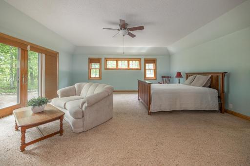 Large main level primary suite with walkout and ensuite