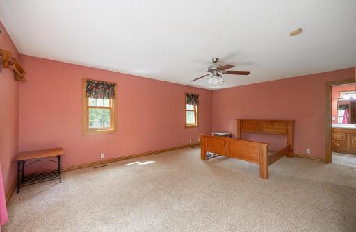 There is another large bedroom with ensuite bathroom in upper level