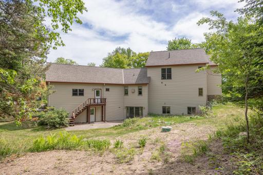 Exterior views of home and walkout from lower level