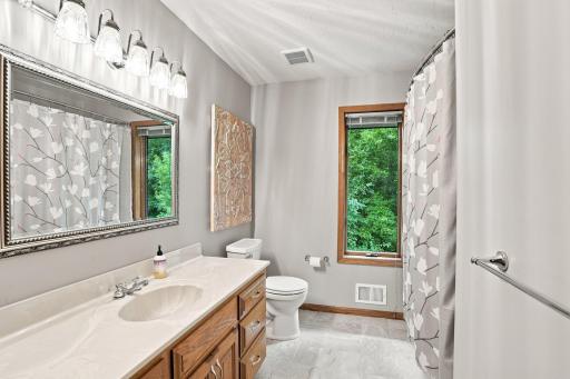 Bathroom on upper level with large counter space