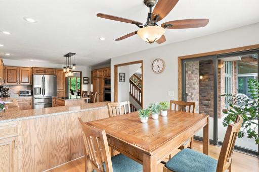View of the kitchen from the breakfast nook. Patio door leads to the front porch.
