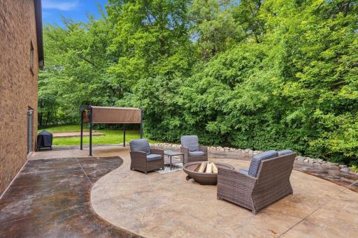 Side patio with fire pit area - great for entertaining!