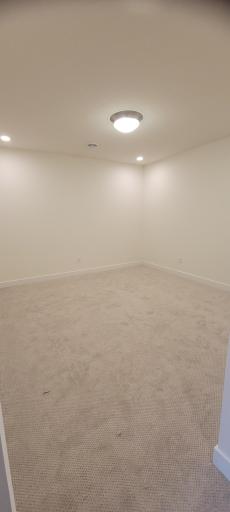 This incredible home features a special bonus room off of the lower level recreational room, providing yet another space for a special hobby or even a in-home workout gym.