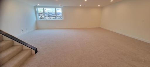 Expansive lower-level layout offers incredible flexibility for modern living and offers generous natural lighting.