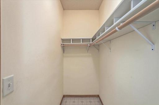 Large walk-in closet next to laundry and garage,.