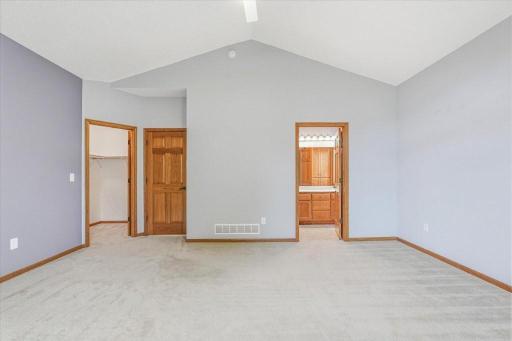 The primary bedroom, bath and walk-in closet.