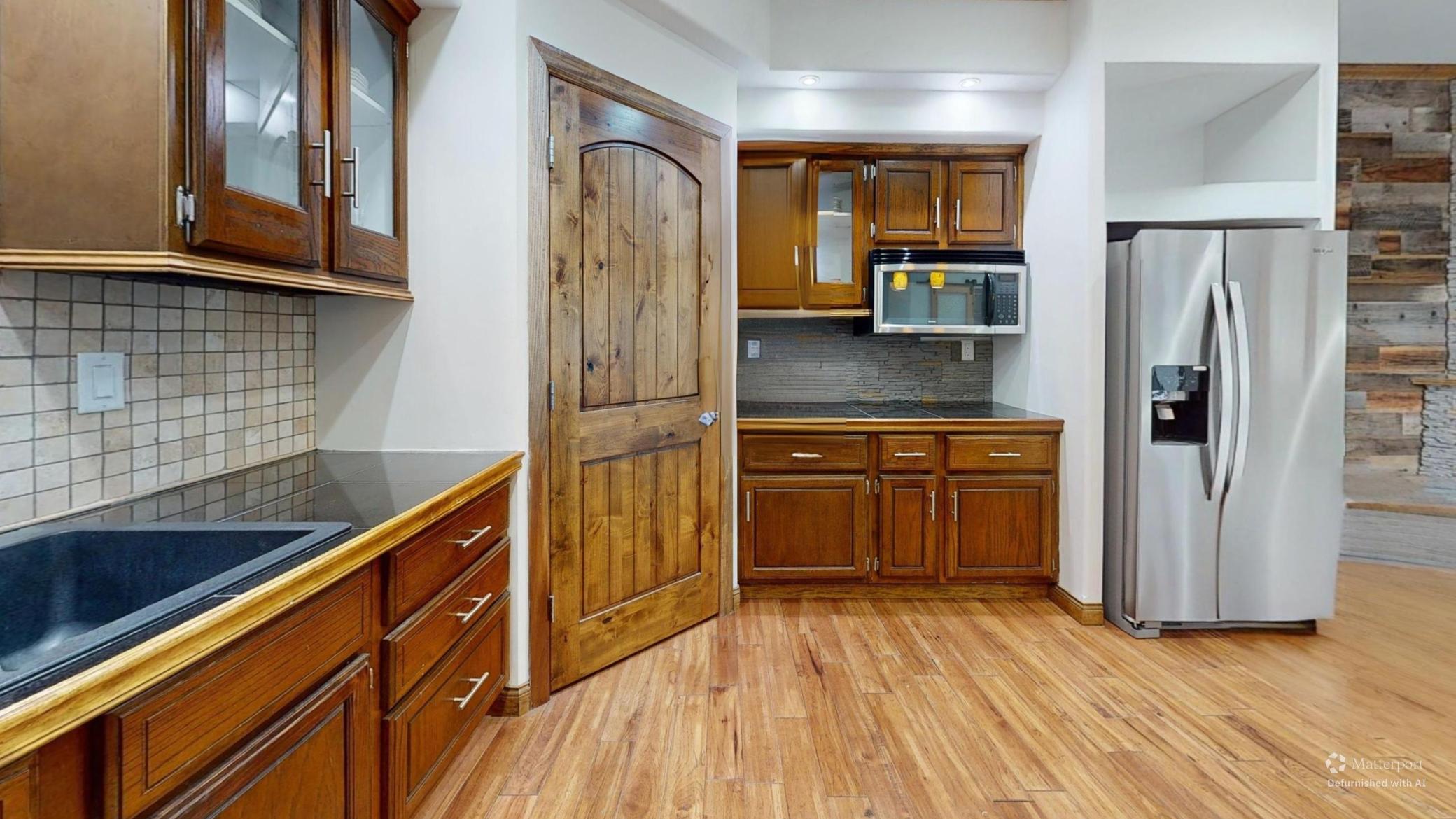 25395-County-Highway-6-Kitchen-Defurnished.jpg