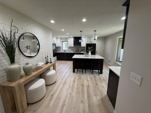 The crown jewel of this stunning remodel is the spectacular chef-inspired kitchen, thoughtfully designed to blend timeless elegance with modern functionality.
