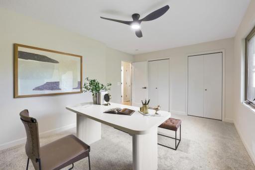 Fresh neutral paint, plush new carpeting, double closet doors & updated lighting provide a clean, modern backdrop, while the generous floor plan offers ample space for a bedroom set, workspace, or sitting area.
