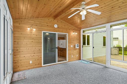 Porch sits off the kitchen with direct access from the porch to the expansive deck