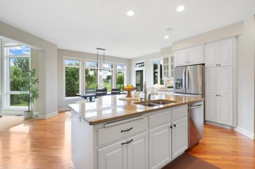 Large kitchen island with granite countertops