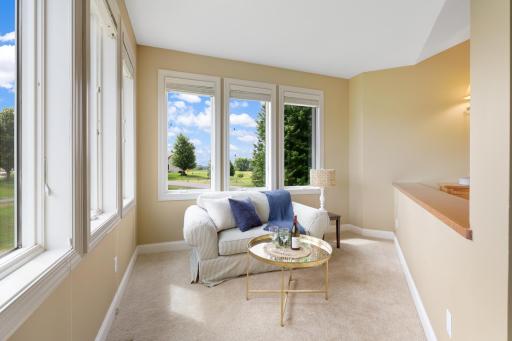 A lovely semi-private sitting room in the primary bedroom