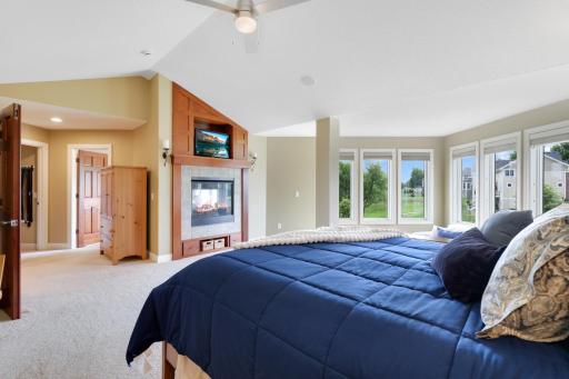 Enjoy the cozy fireplace in the primary bedroom