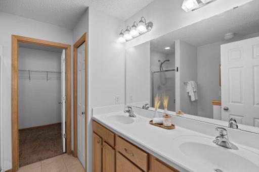 Primary en-suite 3/4 bath. Dual sink and large walk-in closets. Linen closet for extra storage