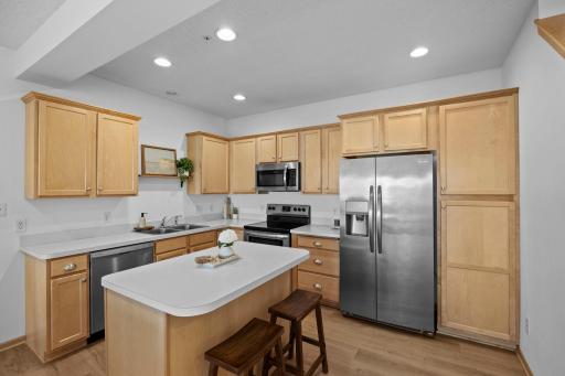 Eat-in kitchen and large pantry next to the refrigerator