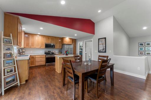 The maple cabinets are custom designed. The walk-in pantry is located in the corner.