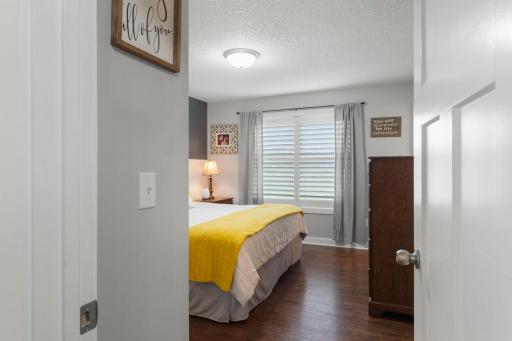 Primary bedroom with window over looking the backyard