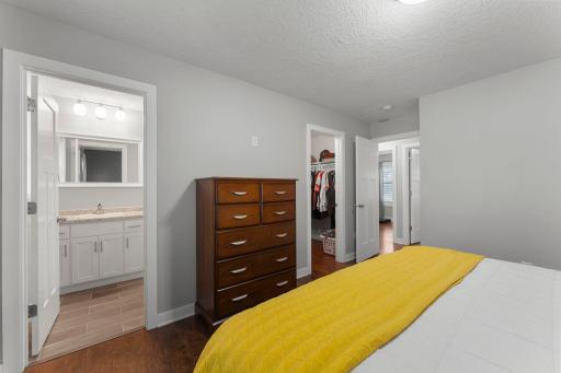 Private primary bathroom and walk-in closet