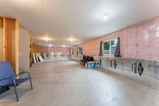 The lower level has garden level windows filling the large space with plenty of natural light.