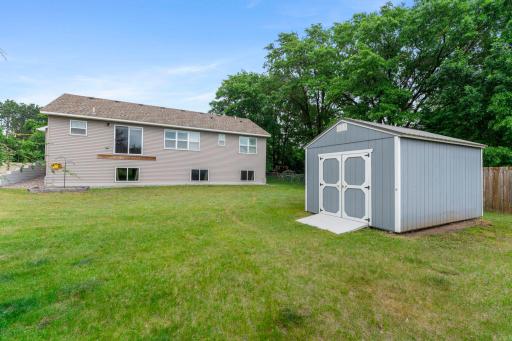 Shed for garden tools and yard games storage.