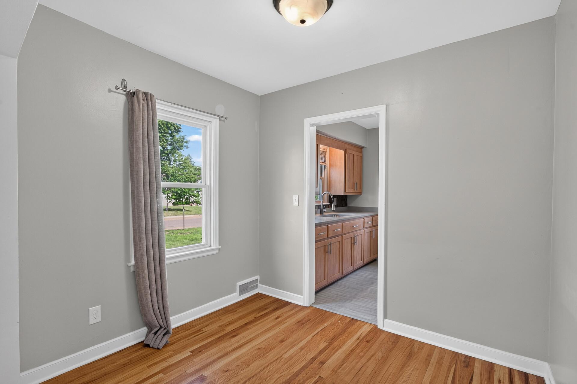Dining room is located between Kitchen and Living Room