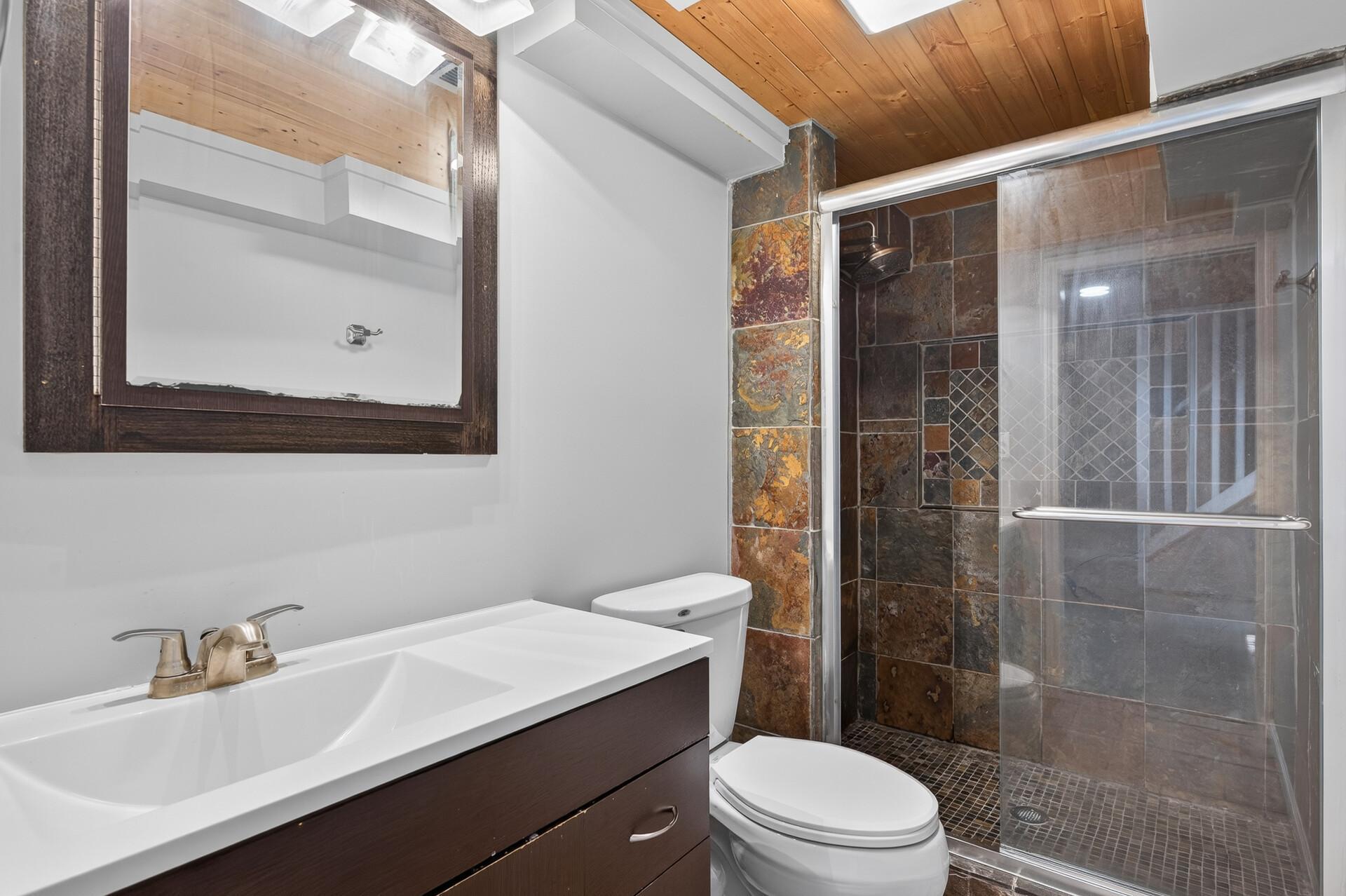 3/4 bath in lower level with tiled shower