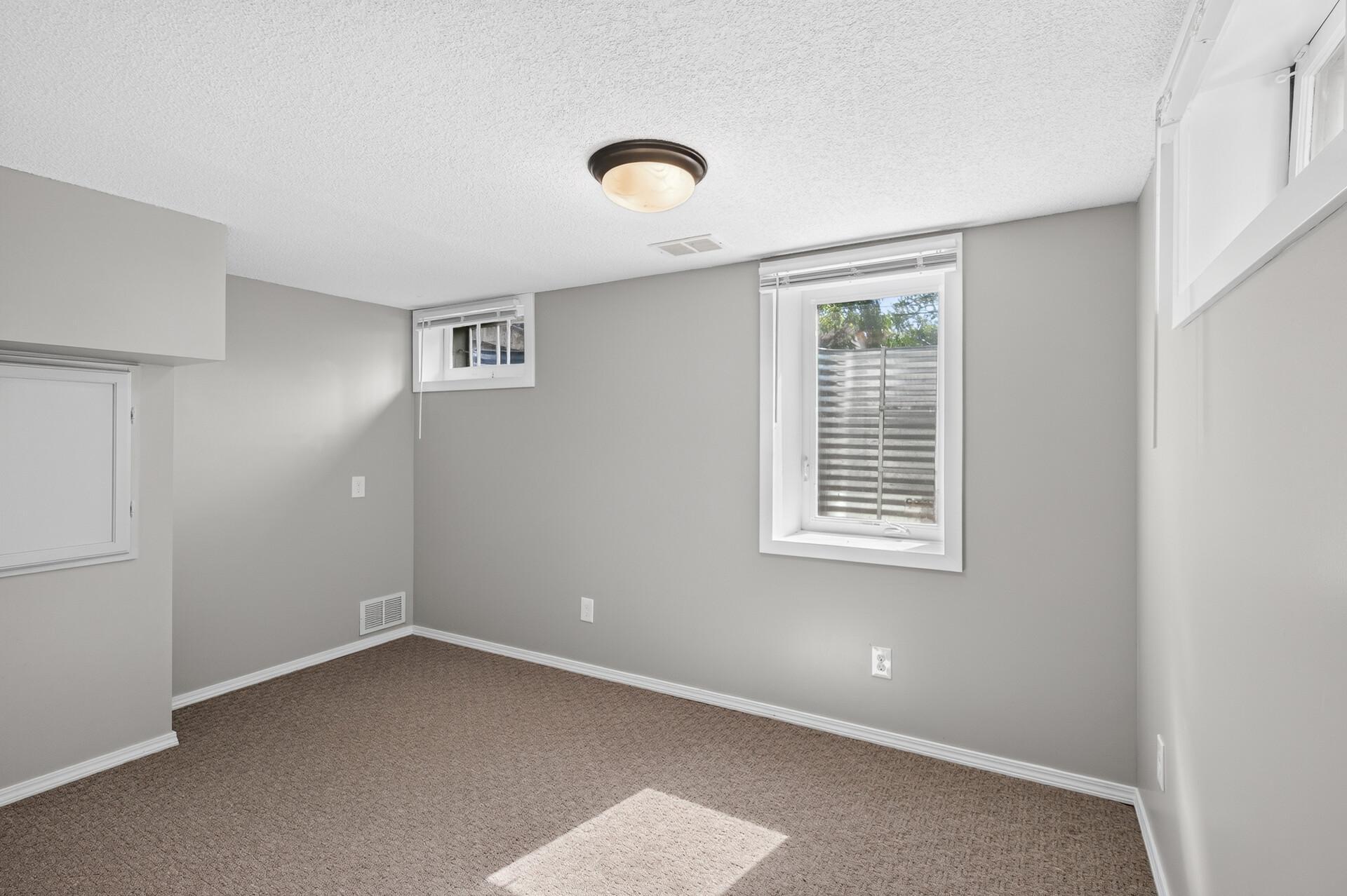 Third bedroom in lower level with egress window