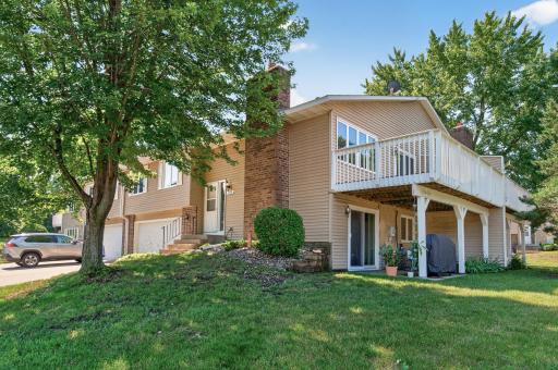 Corner unit with updated decking, walk-out sitting in a great location