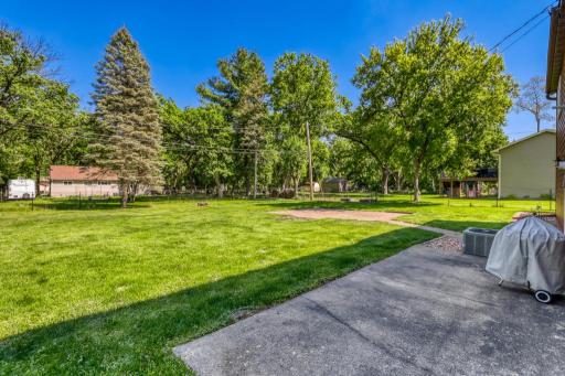 Spacious and level backyard that is fully fenced. Easy to maintain yard. Home used to have an above ground pool. Room to add another pool, shed or playset.