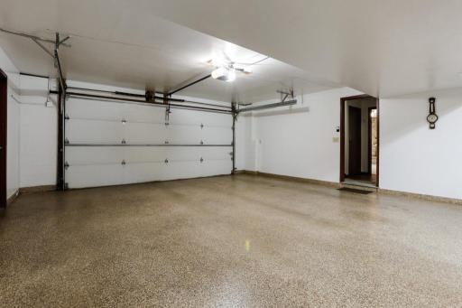 Attached, tuck under garage - entry to the ground level of the home.