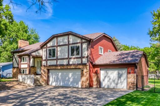 3 Car attached garage and extra parking. 3rd Stall added by previous owner. But has a separate interior wall for a dedicated shop or personal storage.
