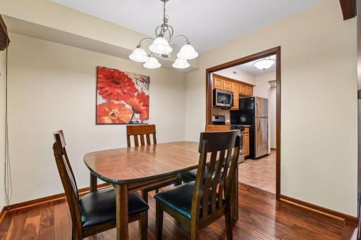 10x8 Main Floor Dining room with North East facing windows leading out to the wooded patio.